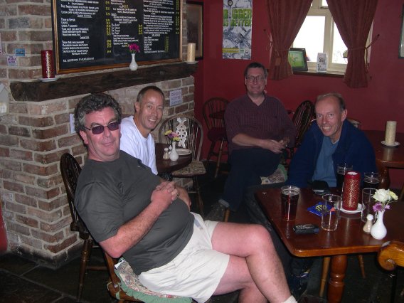 Dick, John W., John S. & Steve having a well earnt drink.